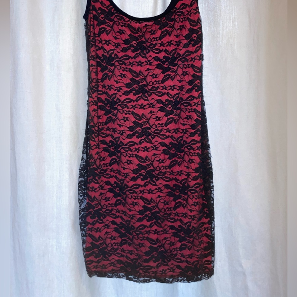 Bright pink stretchy dress with black lace
